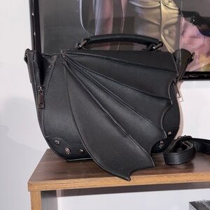 Banned Black Bat Wing Purse